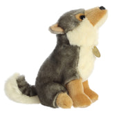 A gray and cream wolf plush toy from Miyoni by Aurora with expressive amber eyes.
